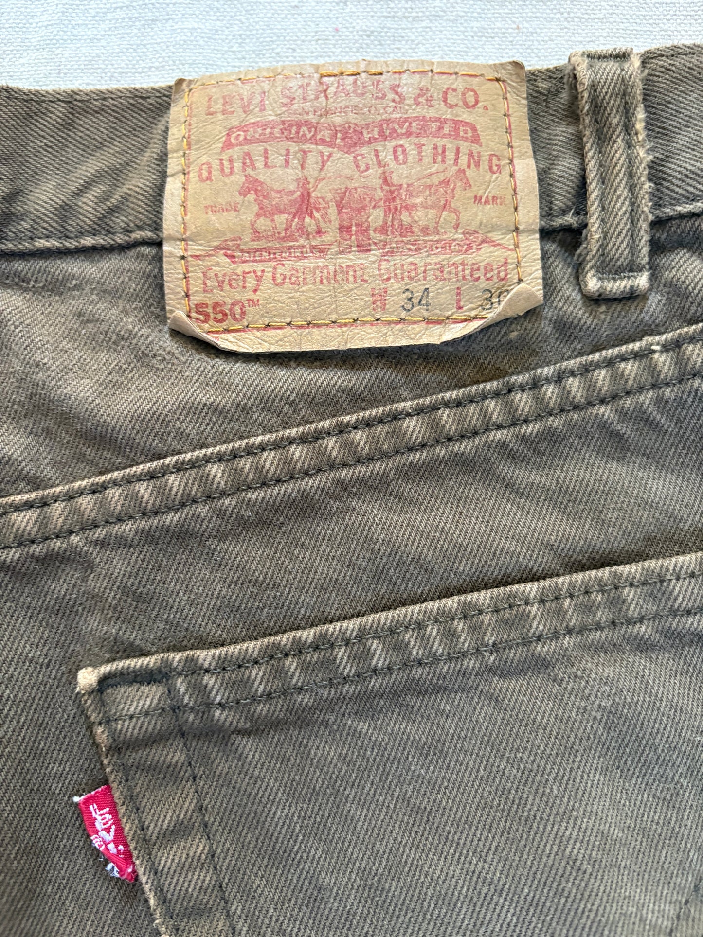 Vintage 90s Green Brown Levi’s 550 Jeans 33x30
