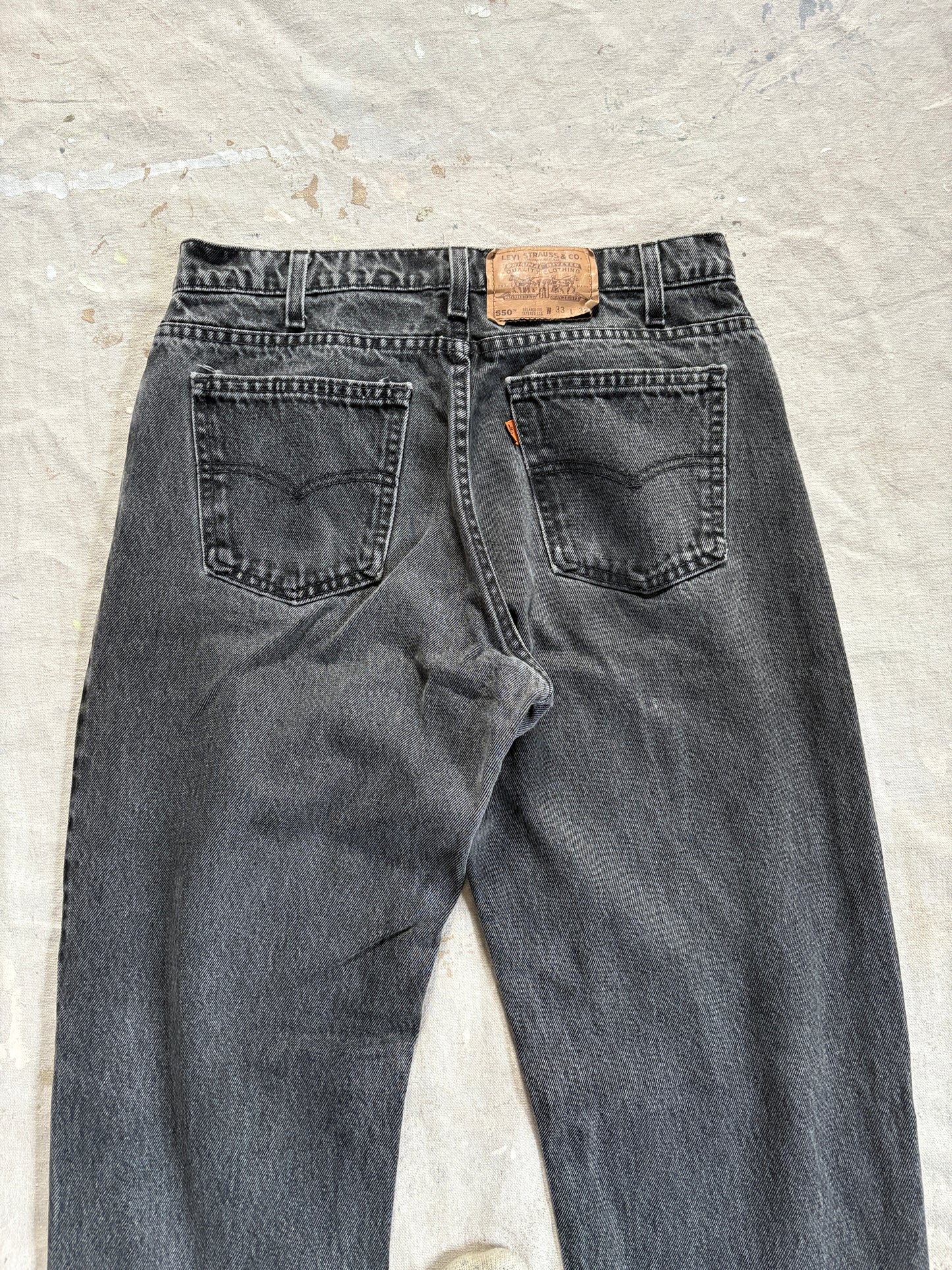 Vintage 90s Faded Black Orange Tab Levi’s 550 Jeans