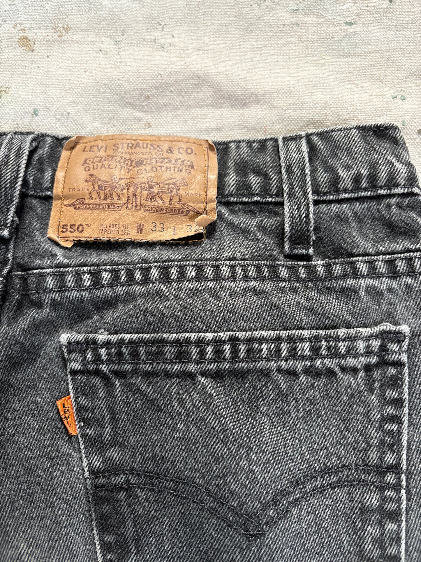Vintage 90s Faded Black Orange Tab Levi’s 550 Jeans