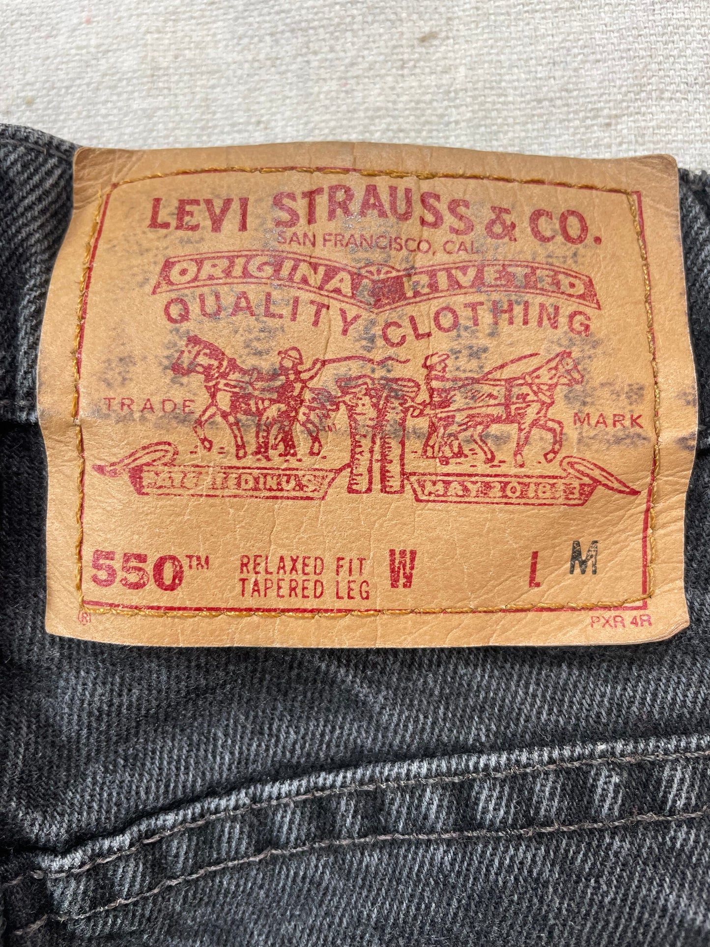 90s Faded Black Levi’s 550s Jeans
